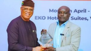 Umo Eno Receives Telegraph Newspaper